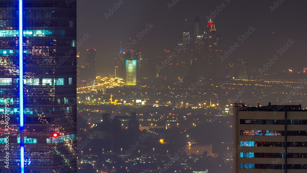 Scenic aerial view of a big modern city at night timelapse. Business bay, Dubai, United Arab Emirates. Scenic aerial view of a big modern city at night timelapse. Business bay, Dubai, United Arab Emirates.