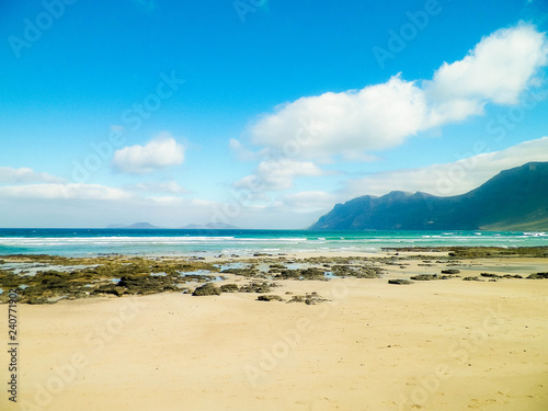 Beach and mountains - beautiful coast in Caleta de Famara, Lanzarote Canary Islands. © Jan