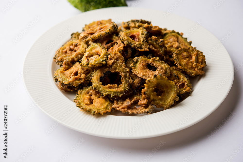 Karela Chips or Bitter Gourd Fry is a healthy snack recipe Karela Chips or Bitter Gourd Fry is a healthy snack recipe