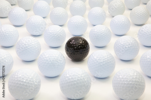 Pattern with white and black golf balls