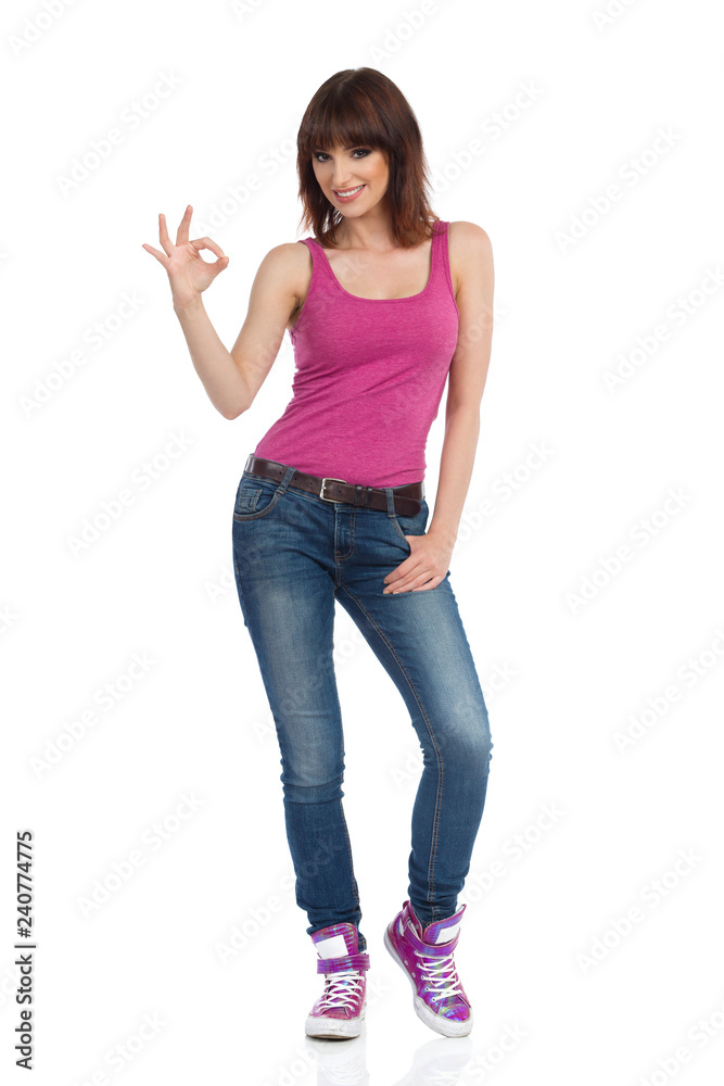 Smiling Young Woman Is Showing Ok Hand Sign Smiling Young Woman Is Showing Ok Hand Sign