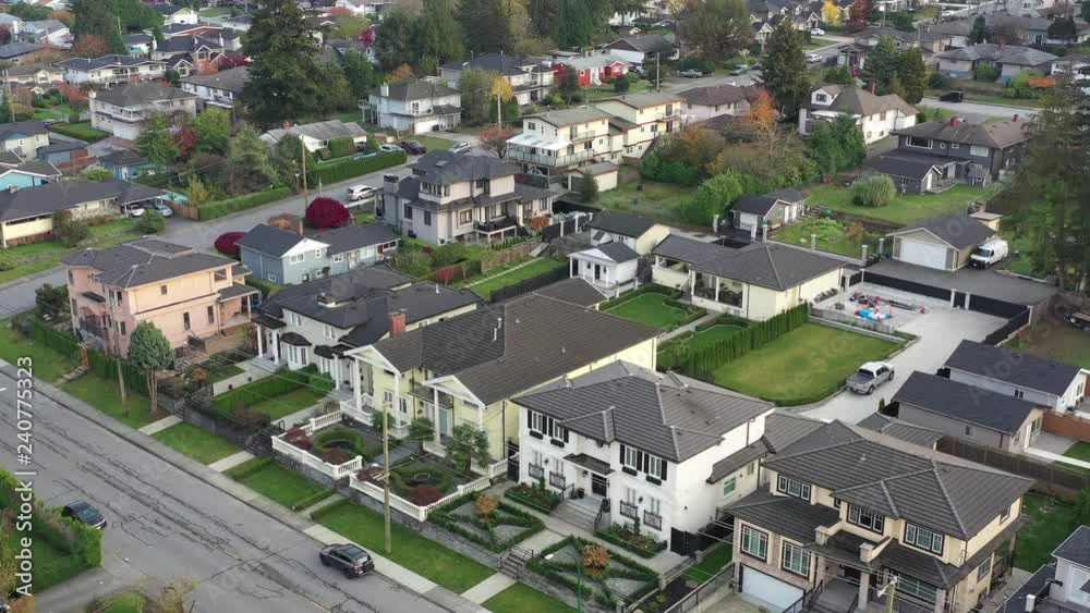 A perfect neighbourhood. Houses in suburb at Summer in the north America. Luxury houses with nice landscape. Aerial drone view. A perfect neighbourhood. Houses in suburb at Summer in the north America. Luxury houses with nice landscape. Aerial drone view.