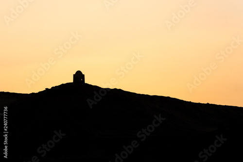 sunset Nile Aswan and the West Bank with Tombs Old Kingdom Qubbet el-Hawa - 'Dome of the Winds' at the crest of the hill