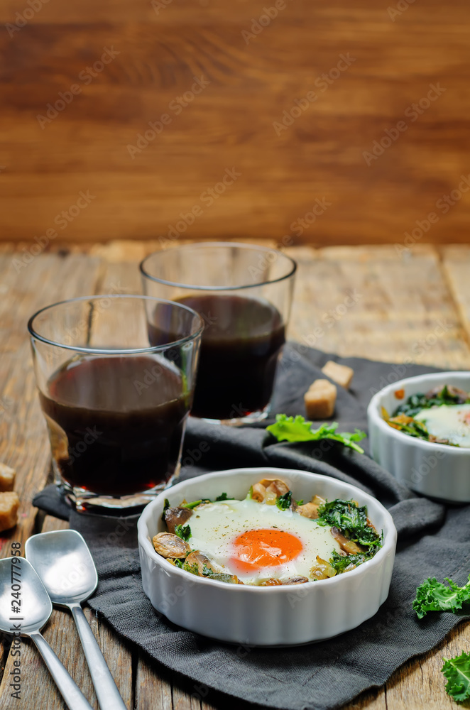 Kale mushrooms baked egg with cups of coffee