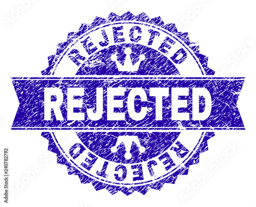 REJECTED rosette stamp watermark with distress style. Designed with round rosette, ribbon and small crowns. Blue vector rubber watermark of REJECTED text with dirty style.