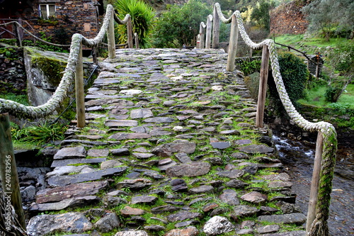 Traditional Houses and Bridges at Foz de Egua, near Piodao, remote village in Central Portugal photo