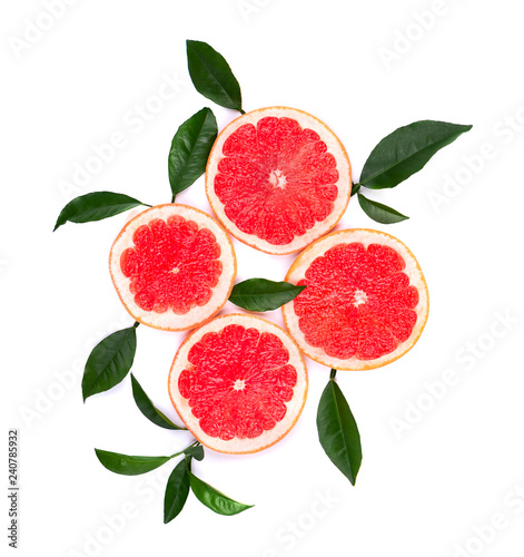 Citrus fruits isolated on white background. Pieces of pink grapefruit isolated on white background, with clipping path. Top view.