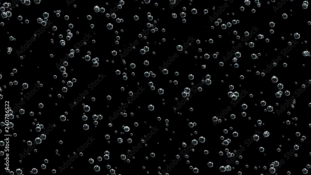 Bubbles of champagne on a black background. Bubbles of champagne on a black background.