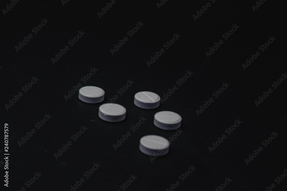 Pile of several medicines on black background Pile of several medicines on black background