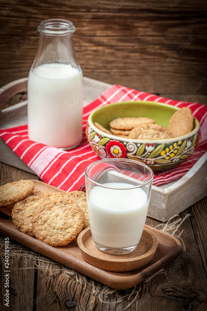 Stack of freshly baked oat biscuits in a bowl. Stack of freshly baked oat biscuits in a bowl.