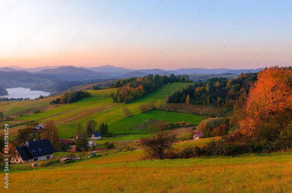 Obraz premium Polanczyk, Bieszczady Mountains, Poland: Sun rising over Solina Lake. Views from near hill.