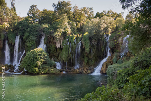 Popular with tourists Kravica waterfall is a large tufa cascade on the Trebižat River, in the karstic heartland of Herzegovina in Bosnia and Herzegovina