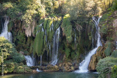 Fototapeta Naklejka Na Ścianę i Meble -  Popular with tourists Kravica waterfall is a large tufa cascade on the Trebižat River, in the karstic heartland of Herzegovina in Bosnia and Herzegovina