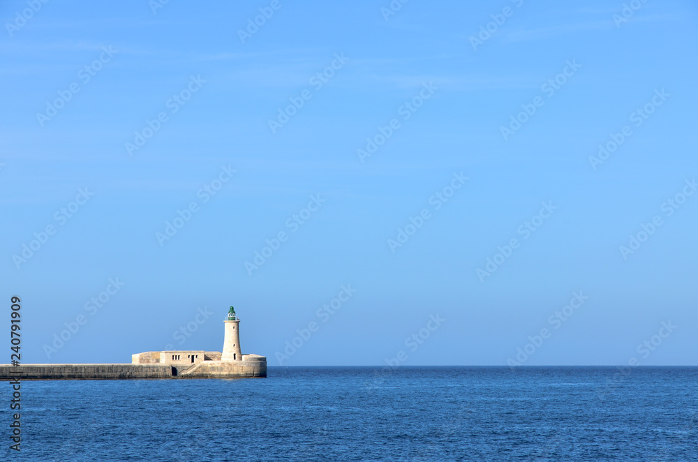 Lighthouse at the Grand Habor in Valletta, Malta