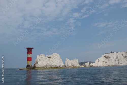 The Needles, Isle of Wight - rocks and lighthouse: chalk cliffs off the south coast of England photo