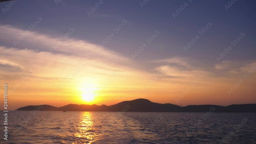 view from the sea to the island during sunset, seascape view from the sea to the island during sunset, seascape