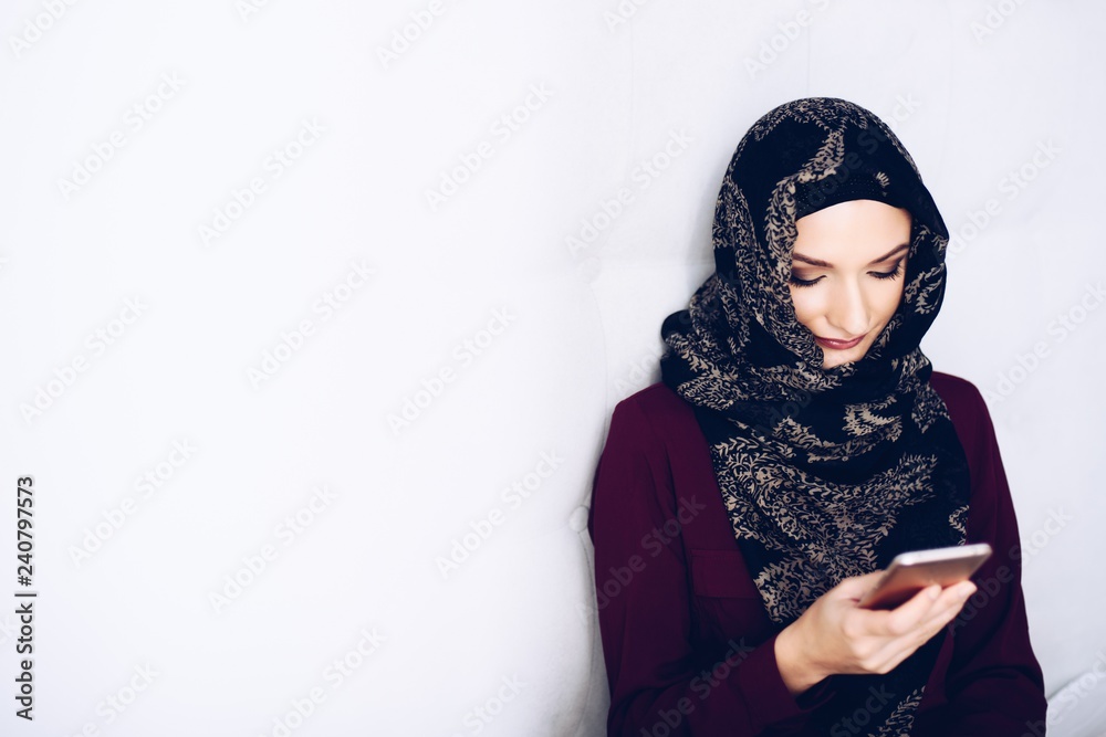 Middle eastern ethnicity woman using smartphone Middle eastern ethnicity woman using smartphone