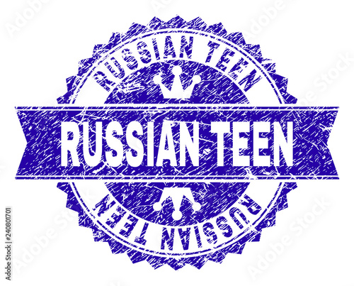 RUSSIAN TEEN rosette seal imitation with distress texture. Designed with round rosette, ribbon and small crowns. Blue vector rubber print of RUSSIAN TEEN caption with dust texture.