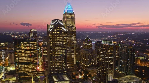 North Carolina Charlotte Aerial v41 Panning detail of towers in downtown at sunset dusk 10/17 photo