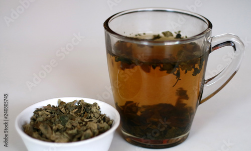 Fig leaf tea and a glass of drink. A great source of fiber and full of vitamins and minerals.