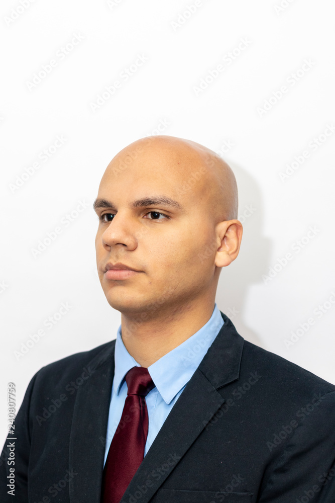 Bald man in suit and tie