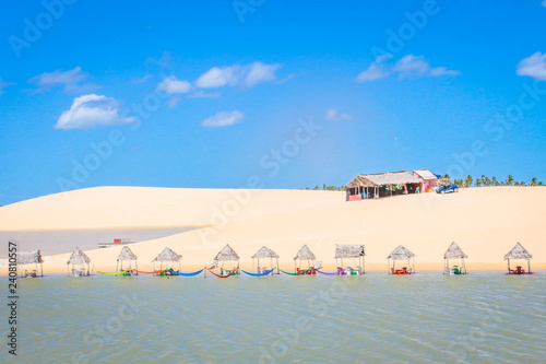 beach with umbrellas and sunbeds photo