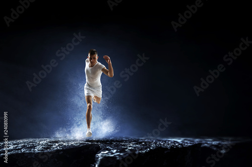 Sportsman running race. Mixed media © Sergey Nivens