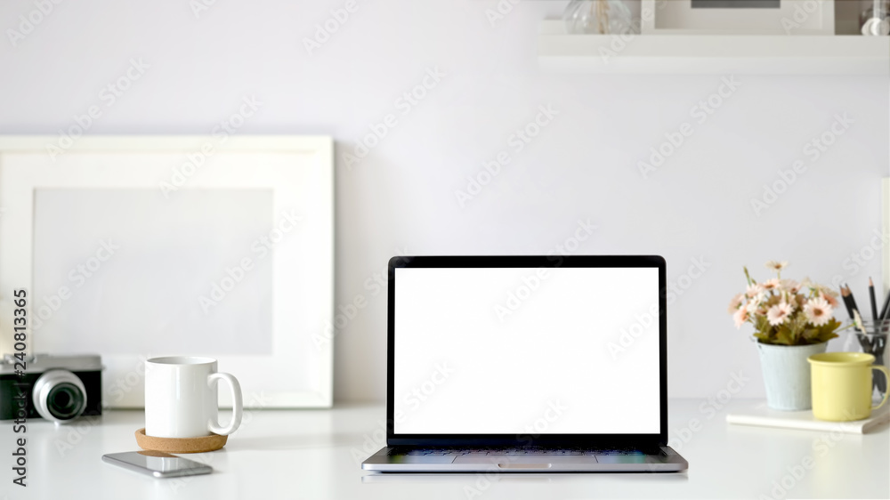 Fototapeta premium Minimal workplace with mockup blank screen tablet