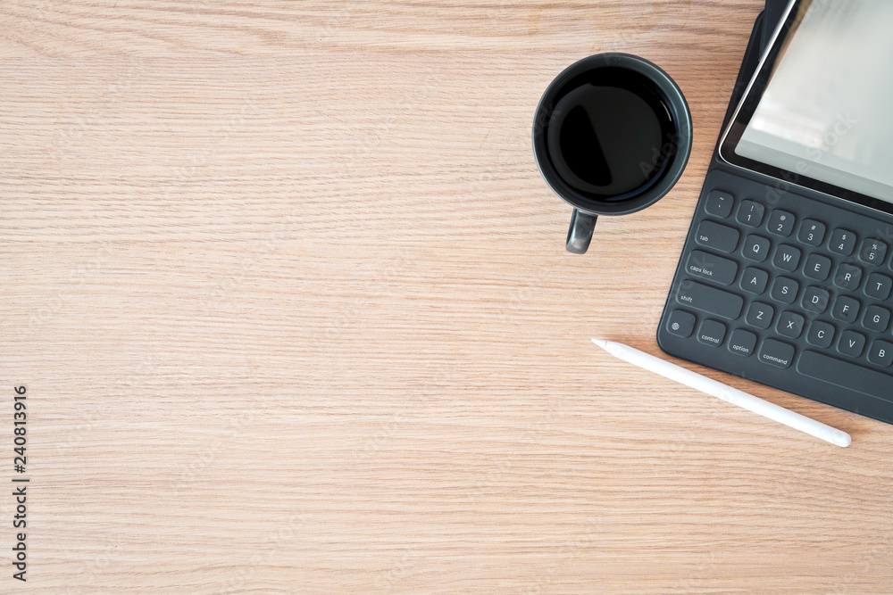 Minimal workspace tablet, smart keyboard and copy space Minimal workspace tablet, smart keyboard and copy space