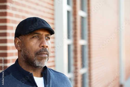 Mature African American man in deep thought.