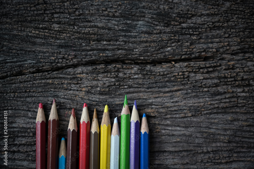 Color pencils on old wood and copy space Color pencils on old wood and copy space