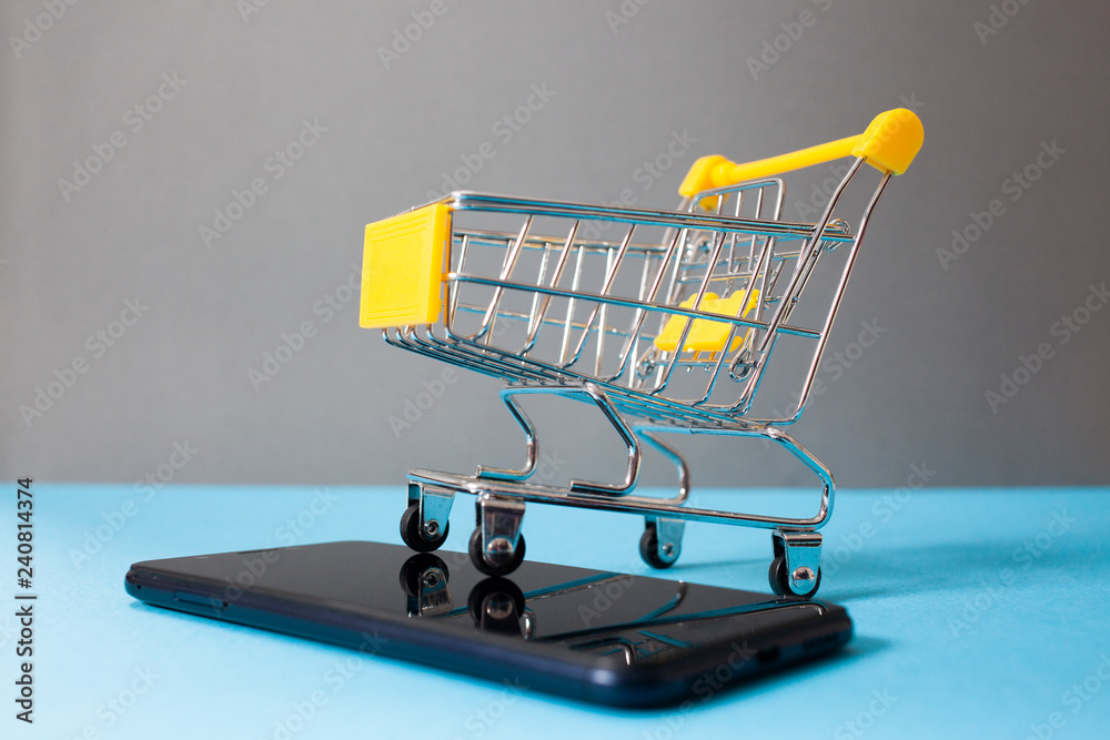  shopping cart on smartphone - e-commerce