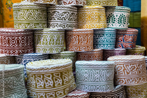 Canvas-taulu Traditional kuma caps in  Muttrah souk in Muscat, Oman