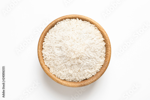 Bowl with rice on white background, top view. Natural food high in protein