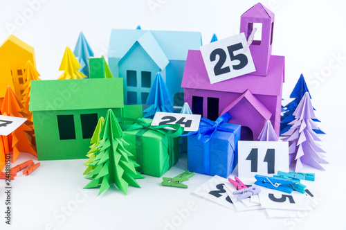 Advent calendar for kid rainbow color. House and Christmas tree paper craft. © Дарья Колпакова