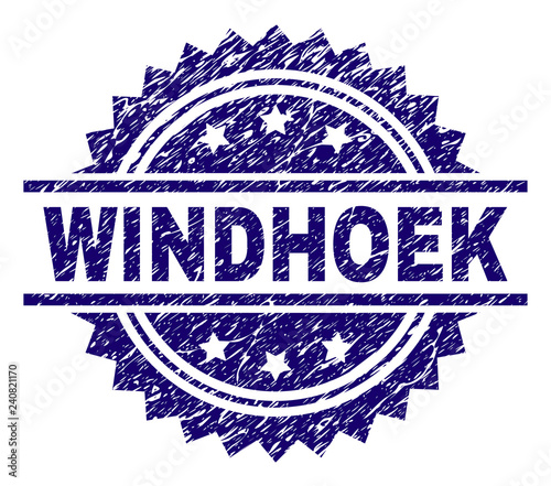 WINDHOEK stamp seal watermark with distress style. Blue vector rubber print of WINDHOEK title with unclean texture.