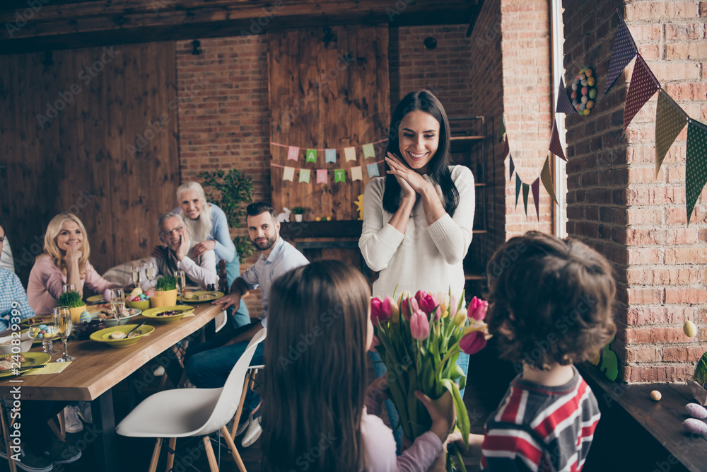 Close up photo of gathered relatives in house table little small Close up photo of gathered relatives in house table little small