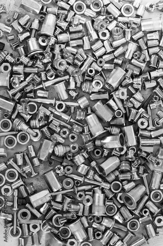 Screws for textured background. vertical. Monochrome