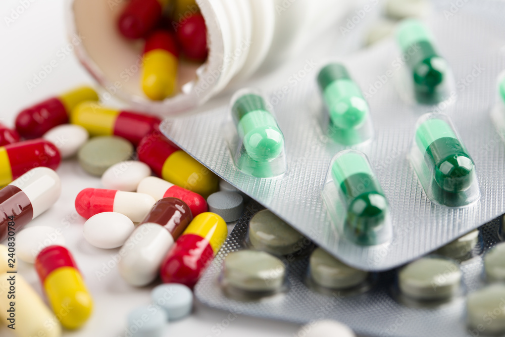 Medicine pills, tablets and capsules over white background Medicine pills, tablets and capsules over white background