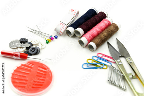 Sewing tools and accesories on white background. © keatikun