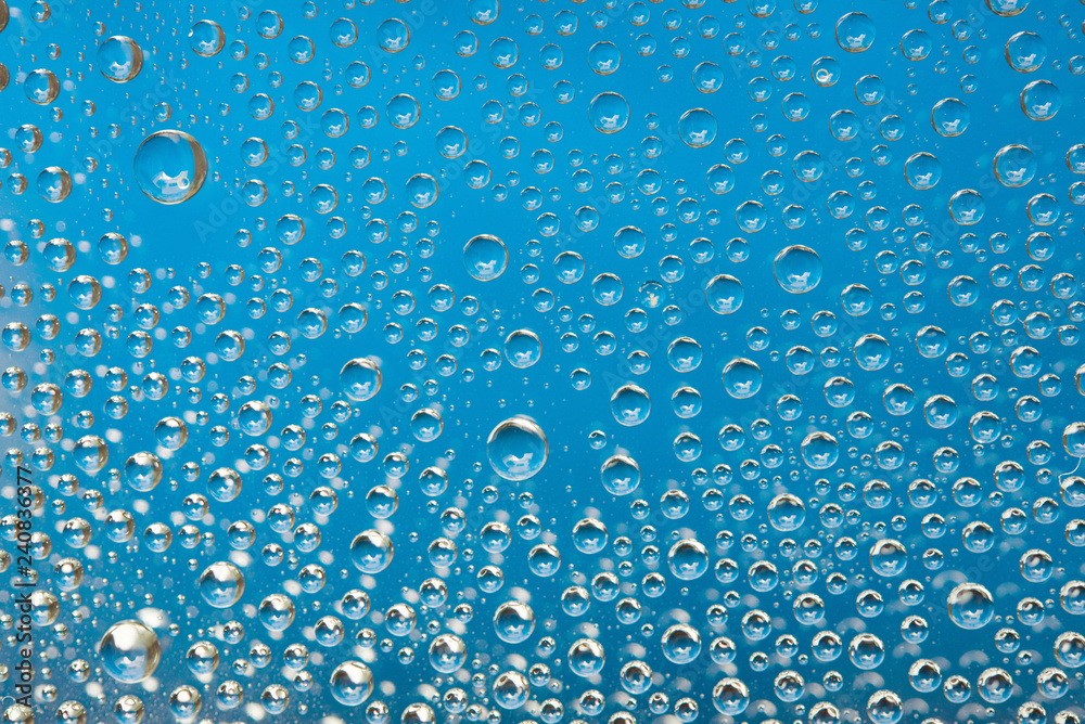 Blue water droplets background
