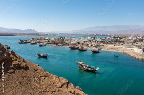 Traditional wooden dhow boats in Sur, Oman