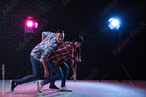 Young couple dancing in club © Pixel-Shot
