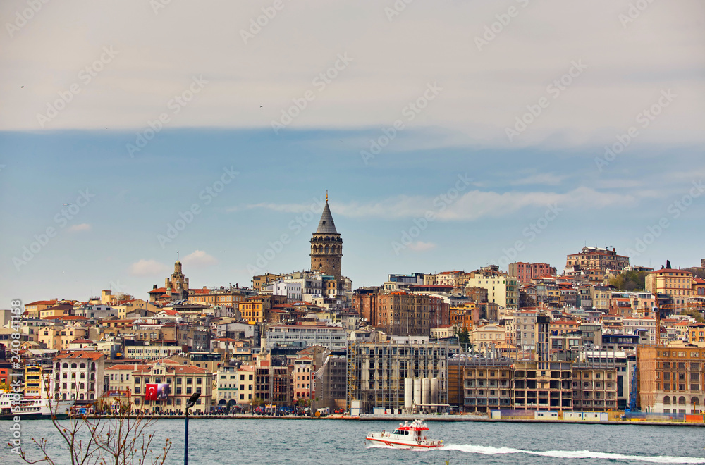 Fototapeta premium A picturesque view of Istanbul and the Galata Tower from the side of the Bay of Bosphorus