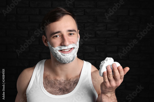 Handsome man with shaving f...