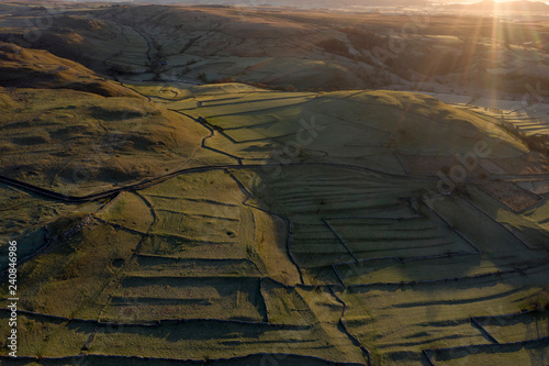 Morning Sunrise Malham North Yorkshire Yorkshire Dales Frost WInter Ariel Drone Flare Hills Grassland Walls Trees countryside uk photo