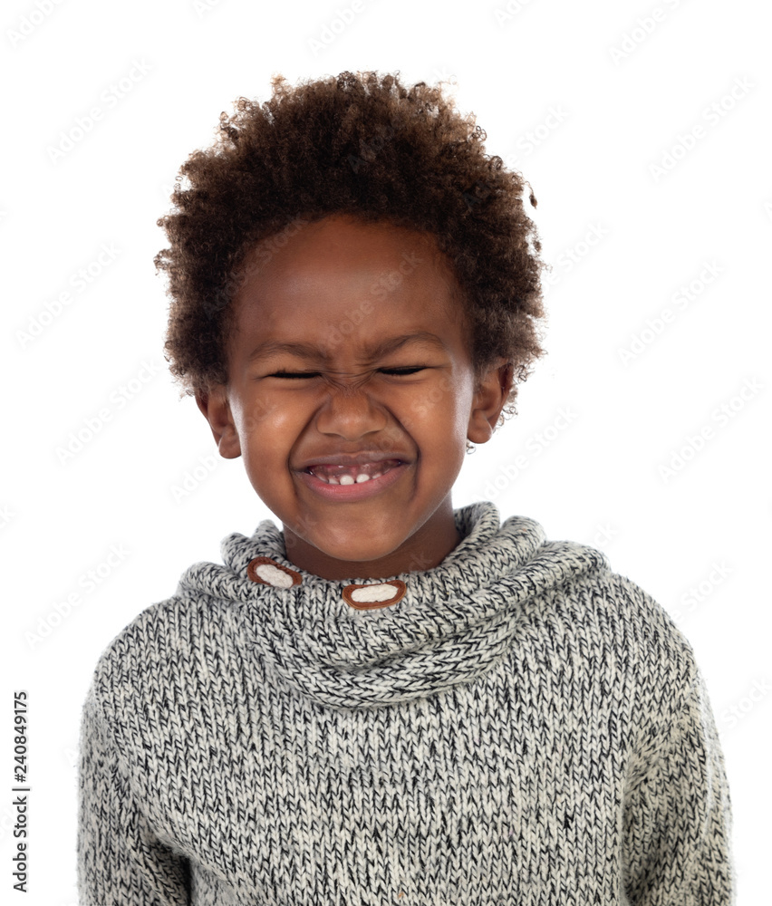 Funny expression of a small african child with clossed eyes Funny expression of a small african child with clossed eyes