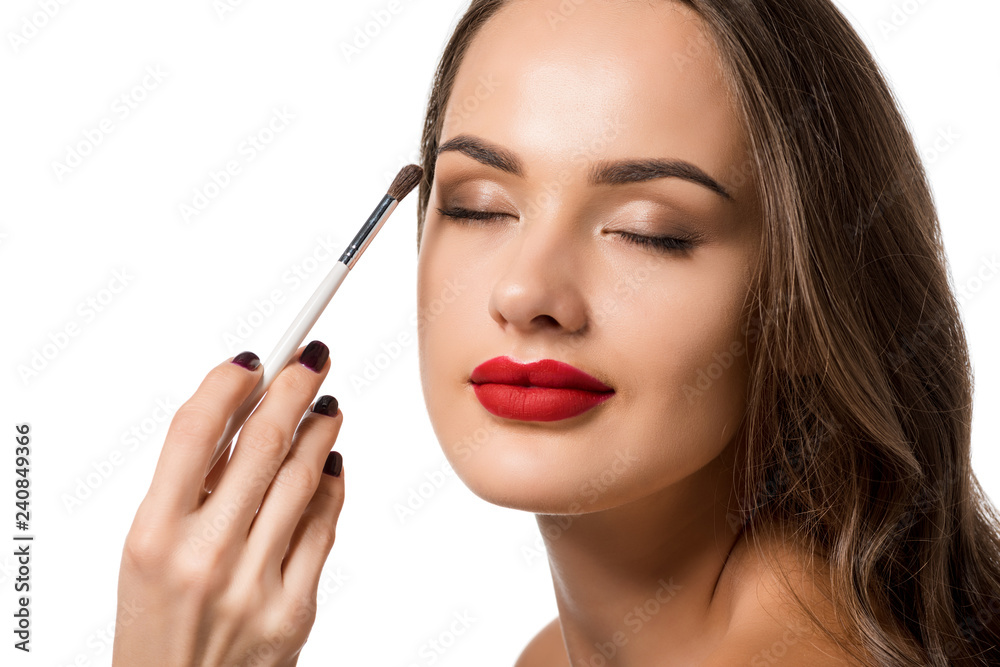 cropped view of woman making up beautiful girl with closed eyes isolated on white cropped view of woman making up beautiful girl with closed eyes isolated on white