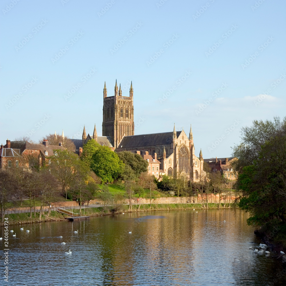 England, Worcestershire, the River Severn flowing past Worcester Cathedral in spring sunshine
