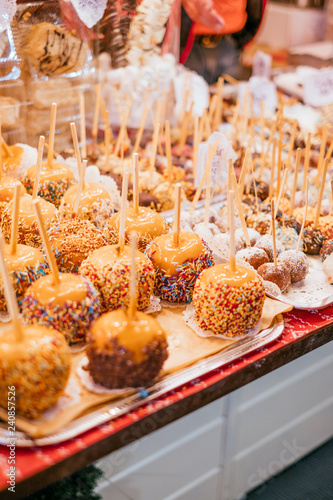 Christmas fair delisious treat known as candy apples or toffee apples.